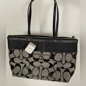 A REAL Coach purse NWT. Black and gray. Plaid inside. Perfect condition